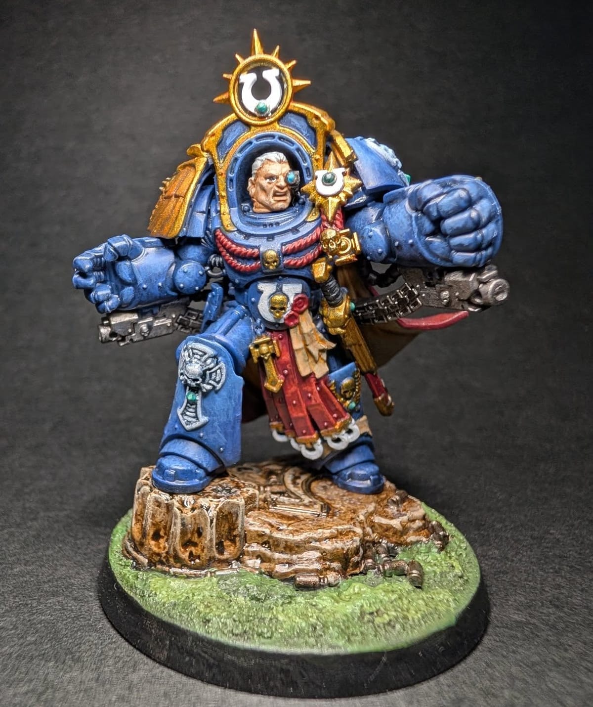 Space Marine Captain in blue power armour with gold trim, painted to display standard by Brooko's Forge