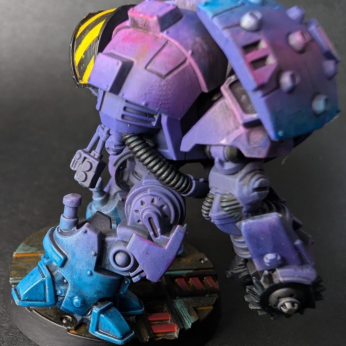 Walker miniature side profile in purple and blue with weathered panels
