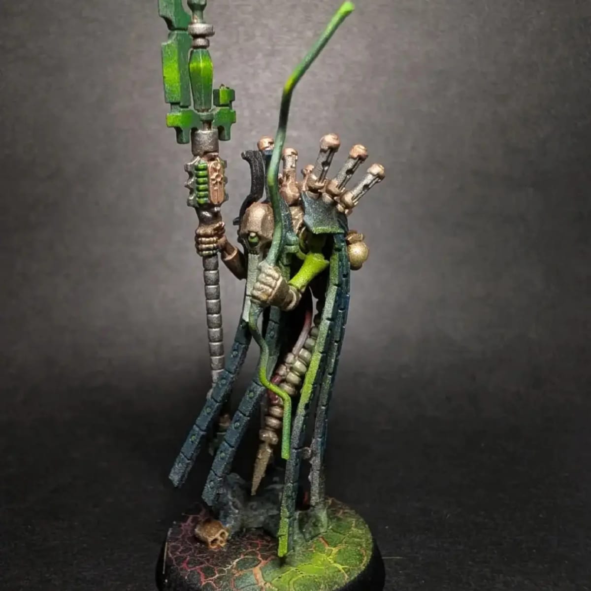 Necron Overlord miniature painted in green and worn metal